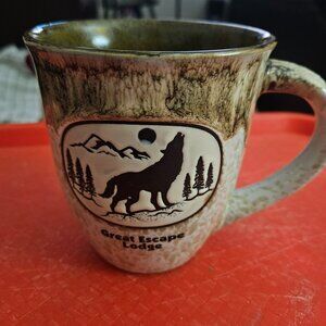 great escape lodge mug featuring a scenic wolf and mountain graphic